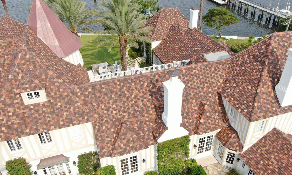 home in palm beach with copper tile roofing