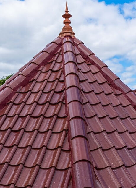 Professionally installed tile roof on steep slope roofing system